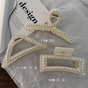 Elegant large cream hair claws with pearls and rhinestones in various shapes and sizes