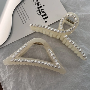 Elegant ivory pearl and rhinestone large hair claw clips in cream resin finish