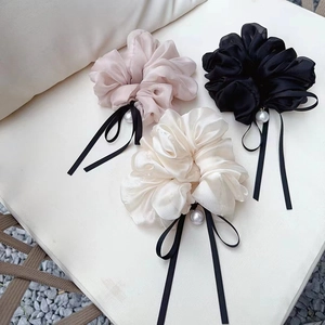 Set di tre elastici per capelli in organza rosa nero e bianco con nastri e perle