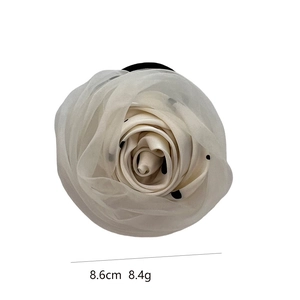 Elegant handmade off-white floral hair tie with black polka dots and elastic band