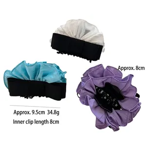 Elegant bow hair claw clips with organza ruffles in white, blue, and purple colors