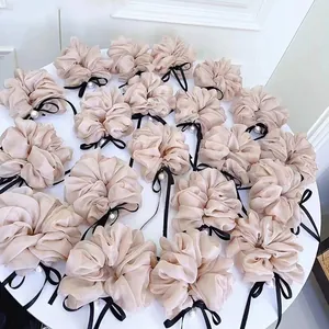 Set di elastici rosa con elegante fiocco nero e perla bianca per capelli donna