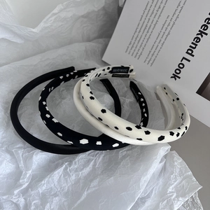 Set of four minimalist sponge headbands with retro zebra and polka dot patterns