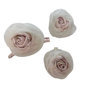 Three-piece set of pink fabric rose hair claws with translucent organza layers