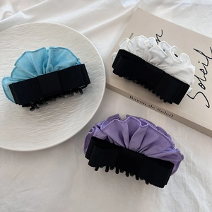 Three-piece set of ribbon bow hair claws in light blue, white, and purple for women