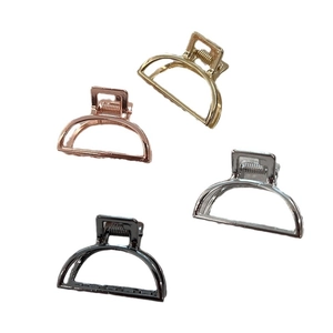 Set of four minimalist D-shaped alloy hair claws in gold silver and rose gold finishes