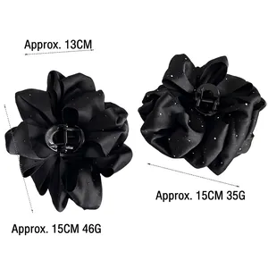 Black satin flower hair claw clip with 13cm and 15cm sizing for elegant hair styling