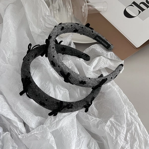 Elegant vintage gray woven headband with black silk bows and handmade luxury design details