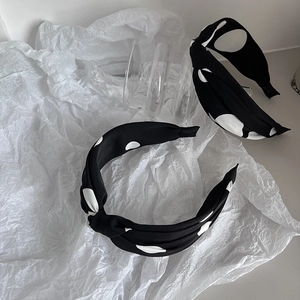 Cerchietto a pois bianco e nero con design a nodo per donna elegante accessorio per capelli