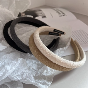 Minimalist fabric headband set in neutral tones including black, grey, khaki and beige