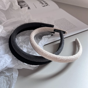 Simple Korean style fabric headbands in black and beige with handmade label and plush texture