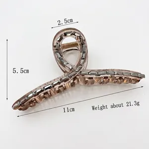 Elegant crystal hair claw clip with amber resin and grey rhinestones, 11cm length