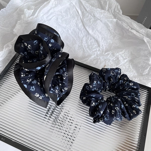 French style navy blue floral scrunchie set with ribbon trim on decorative tray