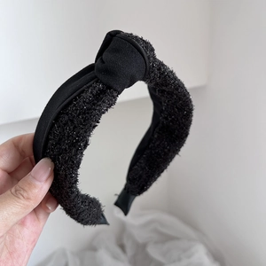 Elegant black tweed knotted headband with subtle glitter sparkles for women hair styling
