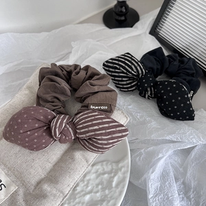 Retro bow hair scrunchies with polka dot and stripe patterns in brown and black styles