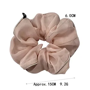 Elegant oversized organza scrunchie in dusty pink with silver trim, 15cm diameter