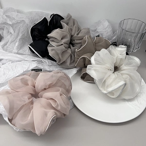 Elegant organza hair scrunchies set in five colors with silver edges and fashion label