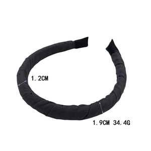 Classic black fabric headband with soft sponge padding for women’s hair styling