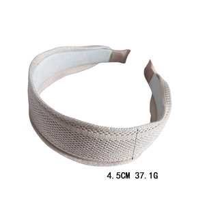 Detailansicht eines 4,5 cm breiten beigen Strickstirnbands mit Netzstruktur, 37,1g