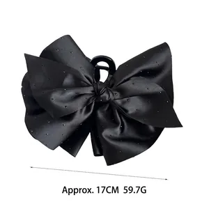 Pince à cheveux élégante nœud en satin noir avec strass et largeur de 17cm pour femmes
