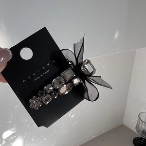 Elegant Korean style black mesh bow hair clip with sparkling rhinestones on display card