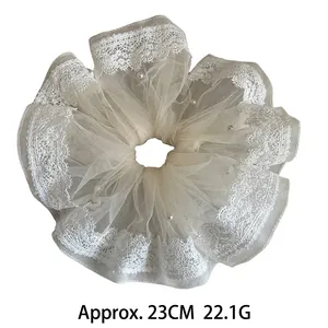 Elegant oversized beige mesh scrunchie with lace trim and pearls, 23cm diameter