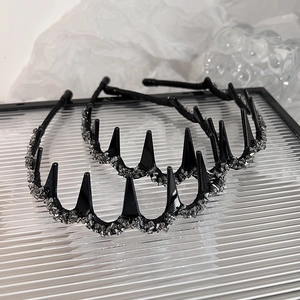 Luxurious black crystal spiked headbands for women with silver glitter embellishments