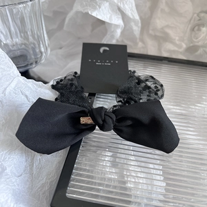 Classic black lace ribbon bow hair tie with polka dot mesh and satin finish for women