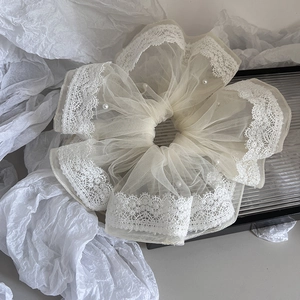 Elegant oversized cream mesh scrunchie with lace trim and pearls for stylish hair styling