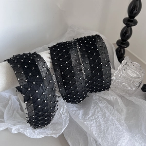 Elegante cerchietto largo in rete nera con strass argentati brillanti in stile retrò