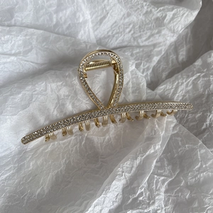 Elegant gold alloy hair claw clip with rows of sparkling rhinestones for long hair