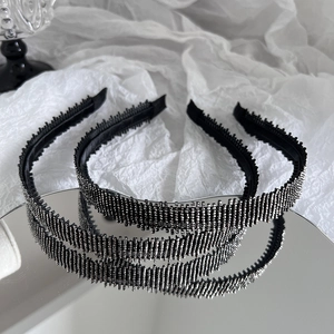 Elegant thin black headband with sparkling silver rhinestones and non-slip teeth texture