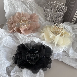 Elegant floral chiffon hair claws in pink, beige, and black colors for women
