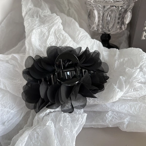 Elegant black fabric flower hair claw clip for women with 3D petal design in 2025 style