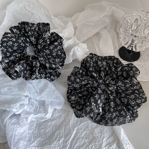 Two-piece set of floral black chiffon hair scrunchies with white petal patterns