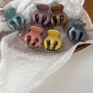 Set of 6 mini 3cm shark hair clips in assorted matte colors for high ponytail styling