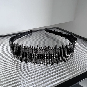 Elegant thin black headband with dense dark grey rhinestones and non-slip inner teeth