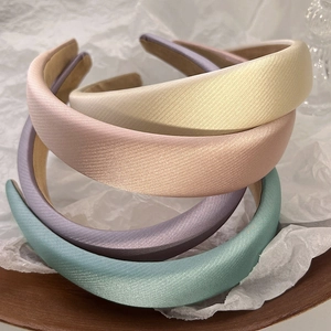 Thick padded sponge headbands in cream and morandi colors with twill satin texture