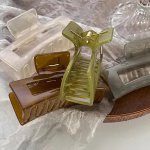 Set di quattro mollette rettangolari per capelli in ambra oliva crema e grigio gel