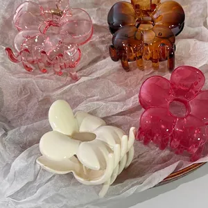 Floral claw hair clip set in transparent pink and amber resin, 6.6cm flower shark clips