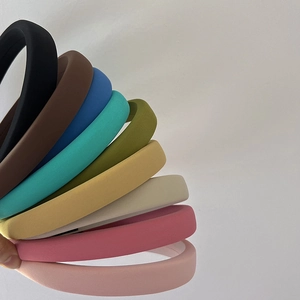 Thick padded sponge headbands in nine candy colors including blue green and pink
