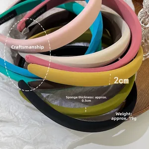 Detail view of 2cm wide padded headbands showing assorted candy colors and thickness