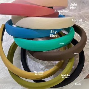 Detailed top view of handmade thick sponge headbands in various vibrant candy colors