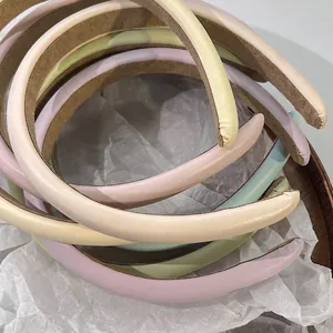 Padded faux leather headband set in Morandi tones with matte finish and non-slip lining