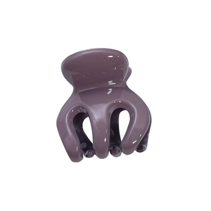 Minimalist purple hair claw clip in a glossy resin finish for high ponytail styling