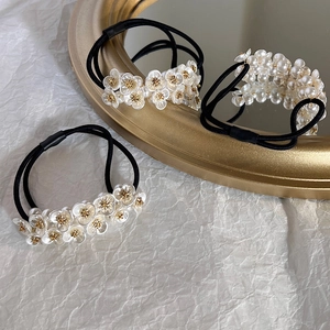 French style flower pearl hair ties in cream white and black for elegant ponytails