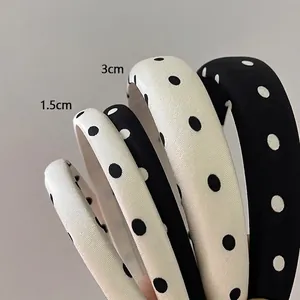 Serre-tête vintage à pois en éponge noire et blanche disponible en 1,5 cm et 3 cm