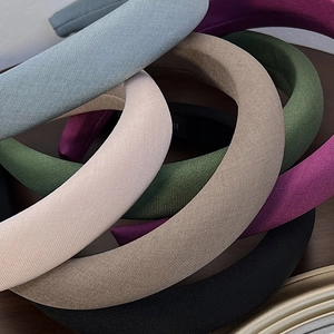 Set of padded headbands in multiple colors featuring vintage style and thick fabric texture