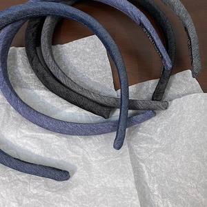Handmade vintage denim blue and navy sponge headbands with a narrow woven texture design