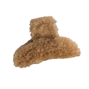 Elegant brown faux fur hair claw clip for women featuring a soft plush winter texture